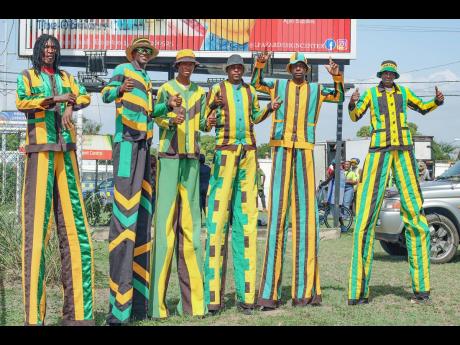 Members of the Action Stilt Walkers group from St James. 
