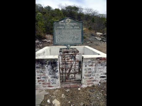 A marker that was mounted below Three-finger Jack’s hideout in St Thomas in 1978.