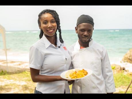 STAR foodie Shanel Lemmie (left) and Oshane ‘Chef Oshea’ Williams show off the finished product.STAR foodie Shanel Lemmie (left) and Oshane ‘Chef Oshea’ Williams show off the finished product.