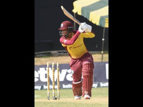West Indies batsman, Brandon King, drives during his innings of 53 in the third T20I cricket match against New Zealand at Sabina Park on Sunday. West Indies won the match by eight wickets.