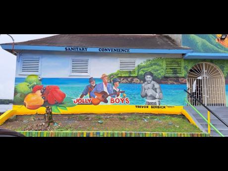 The public bathroom in Port Antonio, Portland on which murals of the Jolly Boys and former heavyweight champ Trevor Berbick was painted.