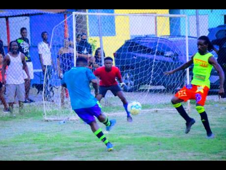 Action from the recent final of Rumbar Sundayz football tournament between Genocide and Church Pen Scheme. Genocide won 5-4 on pealties.
