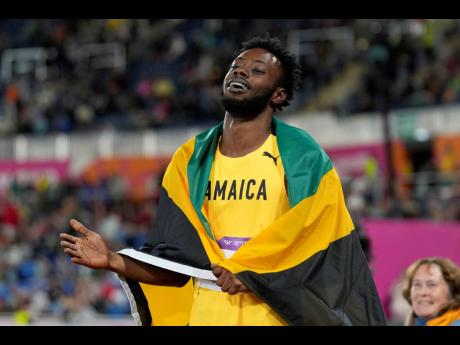 Rasheed Broadbell of Jamaica celebrates after winning the gold medal in the men’s 110 metres hurdles final at the Alexander Stadium at the Commonwealth Games in Birmingham, England, in August.