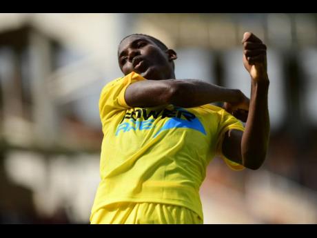 Credit: Gladstone Taylor Garvey Maceo’s Nevaughn Myrie reacts after scoring the equaliser against Kemps Hill, during the Inter-Secondary Schools’ Sports Association (ISSA)/Digicel daCosta Cup football match at Sabina Park on Saturday. The game ended 2-2 and it opened the start of the competition.