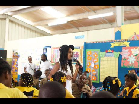 Credit: Contributed Students tuned into Koffee as she presented on ‘anti-bullying’.