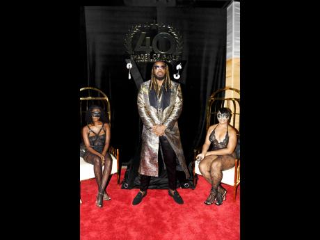 The Universe Boss, Chris Gayle, is surrounded by two of nature’s finest princesses.
