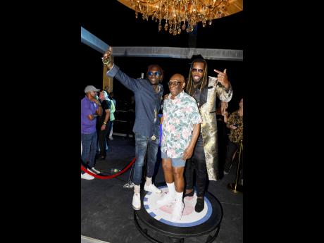 Ninety-two-year-old Dudley Gayle, the father of Chris Gayle, was out enjoying his legendary son’s party. He is flanked by entertainer Tanto Blacks (left) and the Universe Boss.