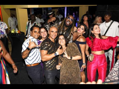 Chris Gayle and the crew having fun at his home in Chancery Hall, St Andrew, on Saturday.