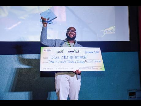 George Walker celebrates the victory of ‘Hairport’ at the Jamaica Cultural Development Commission’s FIWI Short Film Competition.