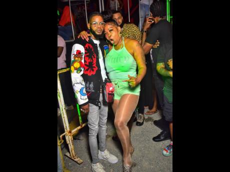 Social media personality and recording artiste Queenie and husband Dowey at Ding Dong’s birthday party on Saturday at the National Stadium car park.