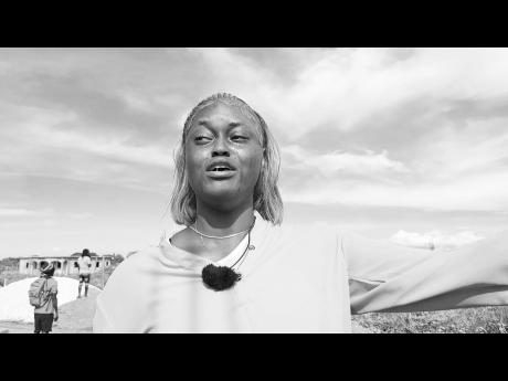 Credit: Contributed A devastated Shaniel Francis cries as her home was demolished yesterday in Clifton, Portmore, St Catherine. The homes of 10 other persons were also torn down after it was revealed that criminals have illegally selling land to prospective residents.