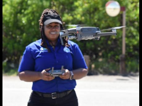 Raynor prepares to launch a drone to get a better view of the marine flora in Port Royal.