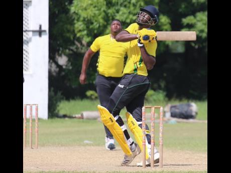 Team B’s batsman Peat Salmon hooks off Team A’s pacer Oshane Thomas during his unbeaten half-century in the Jamaica Scorpions Super 50 practice match at Chedwin park yesterday. Team B won by 27 runs.