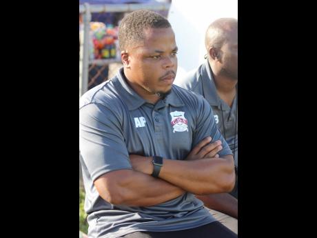 Glenmuir coach Andrew Peart contemplates a play in their recent match against Central High.
