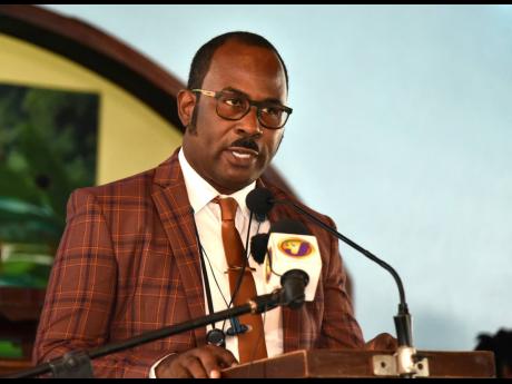 Corporal Rohan James, chairman of the Police Federation, speaking at the funeral for detective sergeant Victor Francis at the Gregory Park Baptist Church in St Catherine on Saturday.