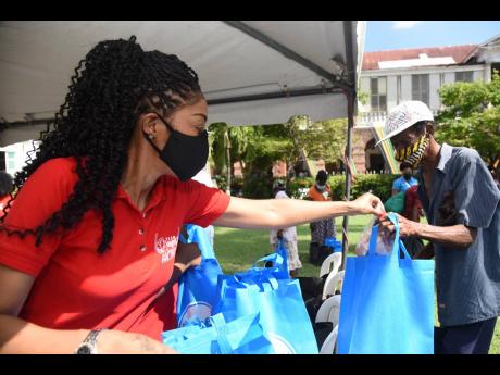 D’Angel gives out care packages during her charity event in December 2020.
