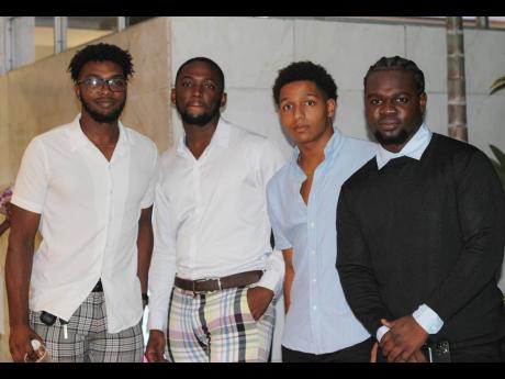 Attending the Sting launch (from left) are Andrew Green, Shamar Spaulding, Christopher Pollard and Howard Chambers.