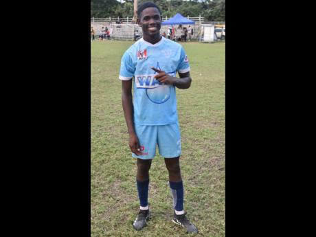 Edwin Allen High’s central defender Kimolar Fearon, after scoring the winning goal against Dinthill in the quarterfinals of the ISSA/Digicel daCosta Cup competition at Drax Hall on Wednesday.