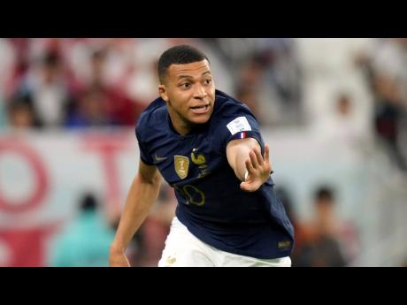 France’s Kylian Mbappe in action during the World Cup round-of-16  match against Poland, at the Al Thumama Stadium in Doha, Qatar, on Sunday. France won 3-1.