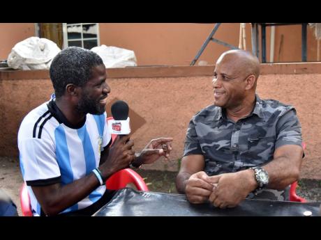 Credit: Kenyon Hemans England supporter David Woolcock (right) tells Cheers To The Cup host Roxroy McLean why he thinks Brazil has a better team than his beloved England.