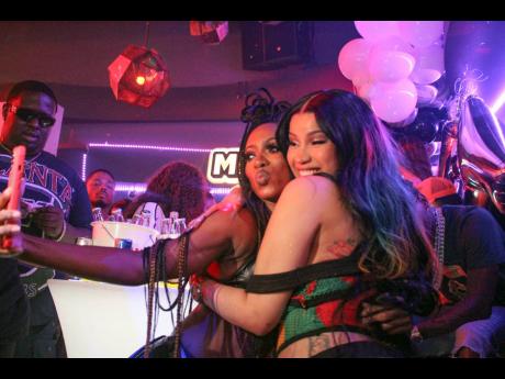Sara Bendii gets warm embrace from international rap star Cardi B as they partied it up inside MECA last Friday. 