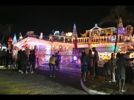 Persons travel from as far away as Kingston to see the lights and decorations put up by the Fentons and the Harrisons.