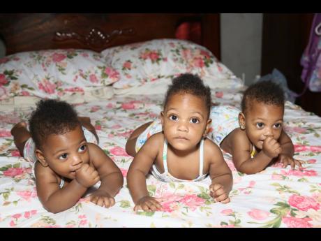 The Nicholson triplets (from left) Kahlia, Kamaya and Katalia.