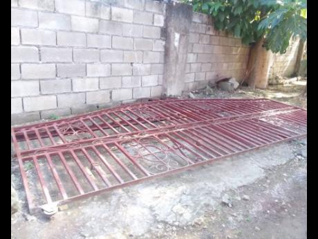 The gate which fell on Liam Williams at the family home in Savanna-la-Mar, Westmoreland, on Wednesday morning.