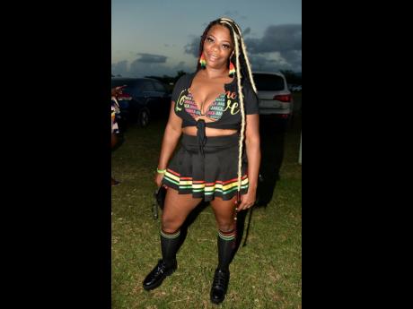 Deedee Thomas went for the black, red, gold and green for her outfit.