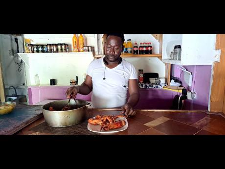 Kevin Morrison, shop owner in Fellowship in the Rio Grande Valley of Eastern Portland, sells a variety of specially prepared crayfish meals.