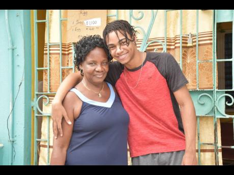 Credit: Nicholas Nunes/Photographer Uhraine with his grandmother Barbara Jones, who is his guardian.