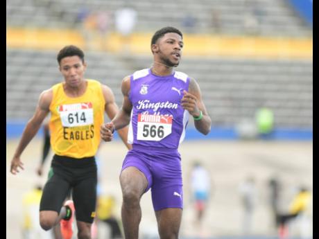 Credit: Gladstone Taylor Bouwahjgie Nkrumie (right) of Kingston College competing in an Under-20 boys 100 metres semfinal at last year’s JAAA National Senior and Junior Championships at the National Stadium.