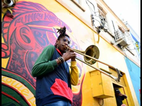 Randy Fletcher, a trombonist, was one of several creatives who gathered on Water Lane for the first Kingston Creative ArtWalk of 2023.