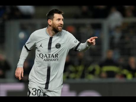 Paris Saint Germain’s Lionel Messi celebrates after scoring their second goal during the French League One football match against Montpellier at the State La Mosson stadium in Montpellier, France, on Wednesday. PSG won 3-1.