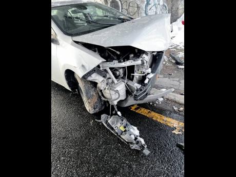 Photo shows damage to the car reportedly driven by recording artiste Knaxx that was involved in a crash.