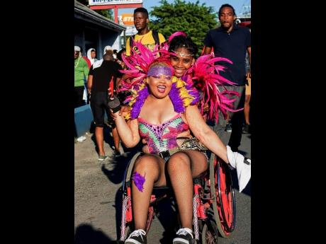 This carnival lover was not going to let her wheelchair affect her fun on Main Street in Ocho Rios, St Ann. 