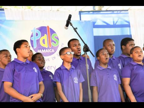 Kingston College students perform at the Peace Day concert held at Calabar Primary and Junior High and Infant School in Kingston.