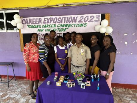 Students and teachers of Enid Bennett High School in St Catherine show off products from the Amazing Scents business.
