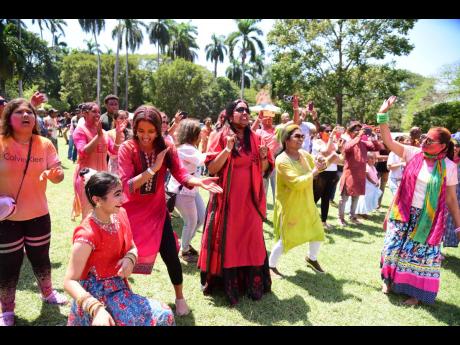 Persons converge on the India-Jamaica Friendship Garden, Royal Botanical Gardens, Old Hope Road, St Andrew, on March 12 to celebrate Holi, the Hindu festival of colours. 