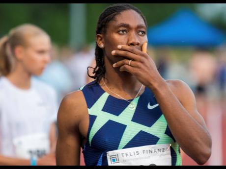 FILE - Caster Semenya reacts before the women’s 5,000 metre race in Regensburg, Germany in June 2021. Track and field banned transgender athletes from international competition on Thursday, while adopting new regulations that could keep Semenya and other athletes with differences in sex development from competing.