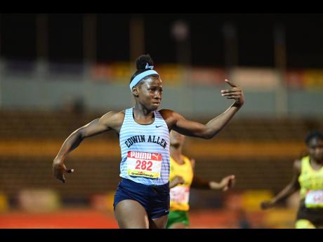 Edwin Allen’s Theianna-Lee Terrelonge is elated to win the Class Three girls’ 100 metres in 11.49 seconds.