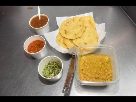 The ingredients for the delectable doubles are two pillowy soft baras (flat-fried breads) filled with chickpeas, chopped cucumbers and sweet and savoury sauces.