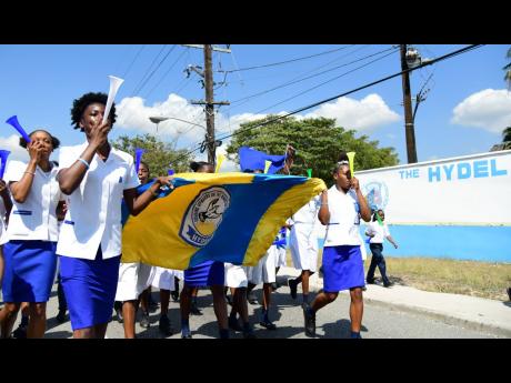 Credit: Kenyon Hemans Students from the Hydel Group of Schools celebrating their historic triumph at the ISSA/GraceKennedy Boys and Girls’ Athletics Championships at the school in Ferry, St Catherine, yesterday. Hydel won the girls’ title for the first time with 279 points, two more than defending champions Edwin Allen High.