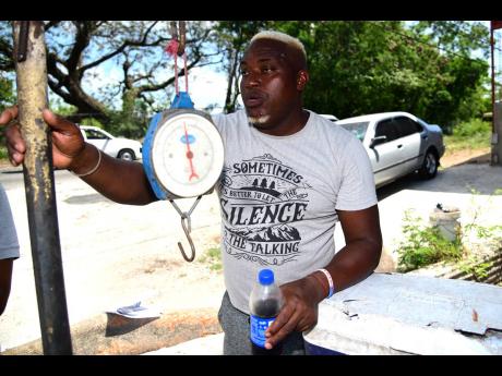 This fish vendor, Campbell, was the one who alerted his colleagues to the fact that a tree was about to fall on a section of the market.