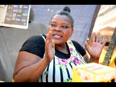 Marva narrowly escaped being hurt after a tree fell on a section of the Twickenham Park Fish Market.