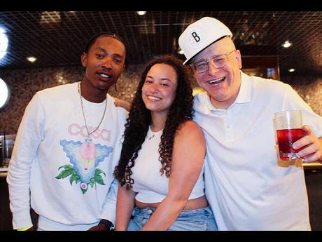 International disc jockey and record label owner Bobby Konders (right) entertained his daughter Kiana (centre) and SJ Mitchell at the post-concert after-party. 