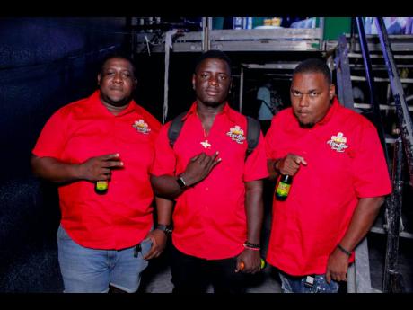 Members of Five Star General sound system (from left) Andrew Pang, Worl Blacks and Craig Genius.