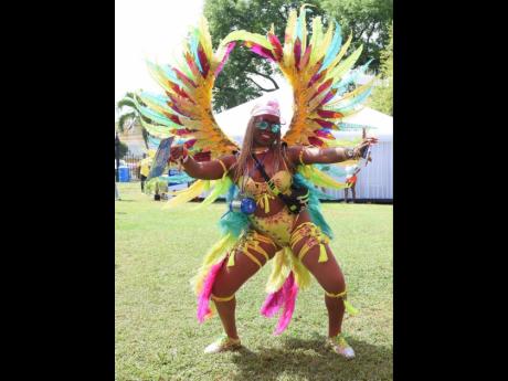 Maudria Reid in her colourful Skittles costume is ready for di road with Xodus-Bacchanal. 