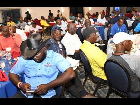 Motorists participate in the second in the series of Grennell’s Driving School’s crash-free 2023 defensive driving workshop, held at The Jamaica Pegasus hotel in New Kingston yesterday. The workshop seeks to train and educate motorists to be safe and responsible drivers in order to reduce crashes. 