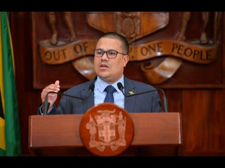 Minister without Portfolio in the Ministry of Economic Growth and Job Creation, Senator Matthew Samuda, addresses a post-Cabinet press briefing at Jamaica House on Wednesday.